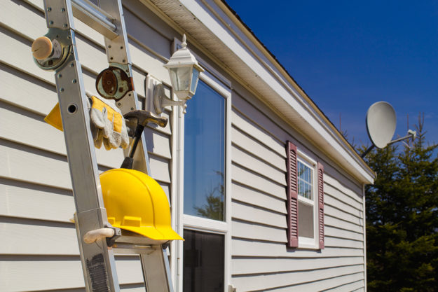 installation of house siding after paying cost