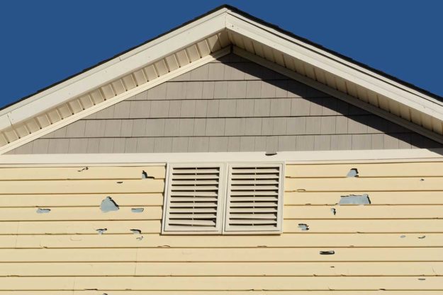 looking at your house for the signs to replace your siding