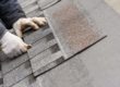 man installing a roof