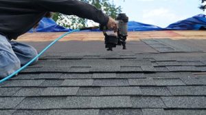 man installs roof in owings mills 