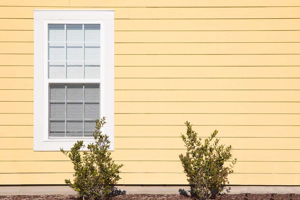 this home has been painted after vinyl siding installation