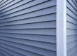 the corner of a house with fiber cement siding