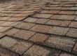 Closeup of a worn down shingle roof