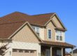New brown shingle roof on a residential home.